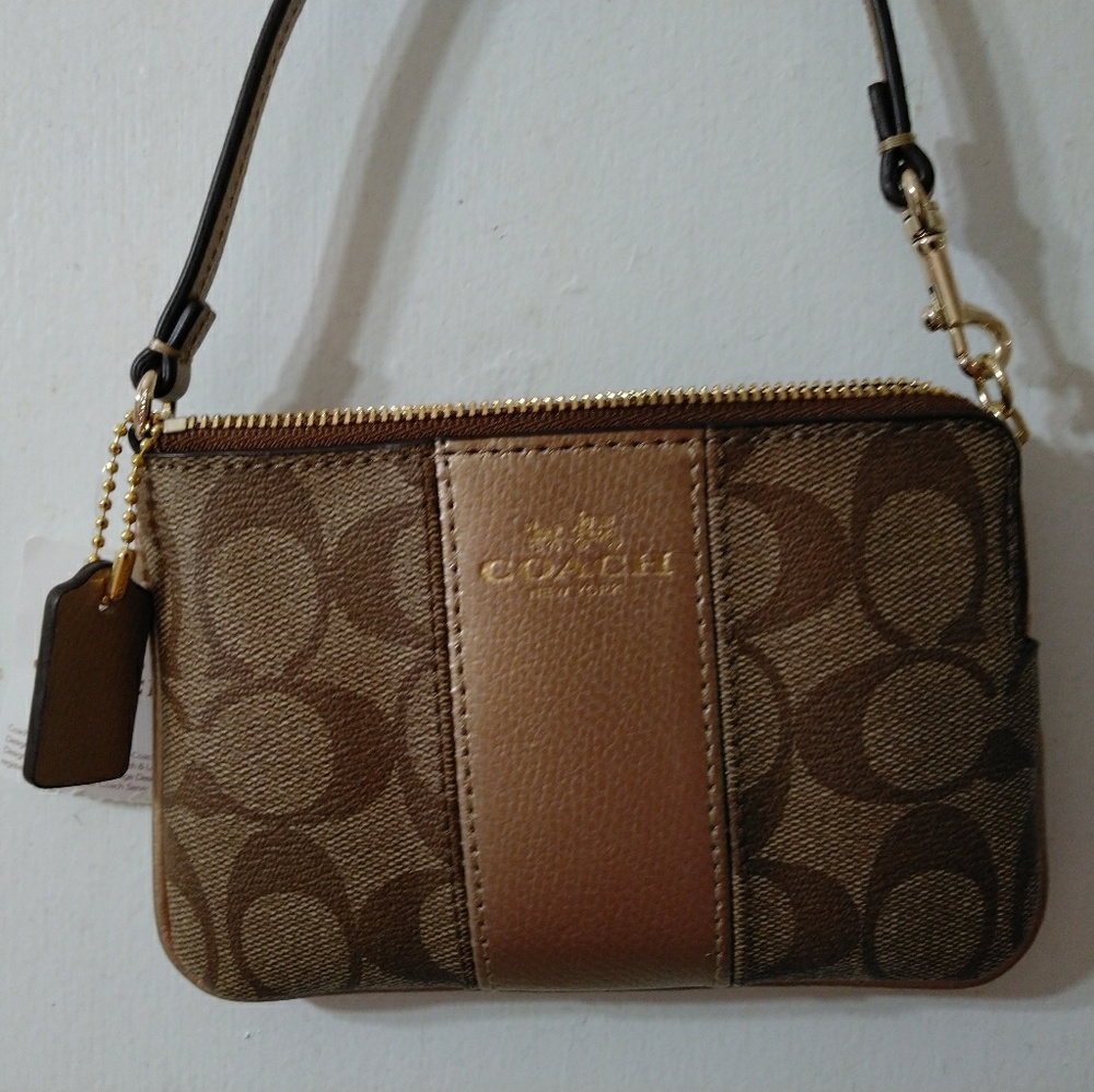 Coach small zip bag